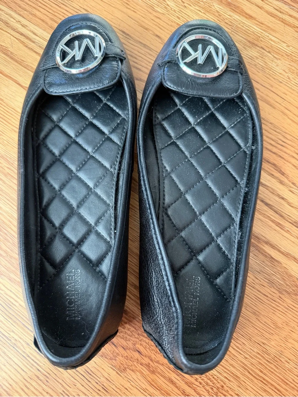 Michael Kors Black Quilted Leather Ballet Flats with Silver MK Emblem
